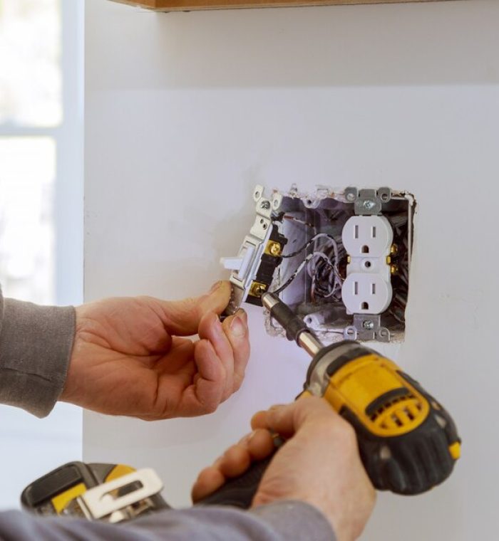 [freepicdownloader.com]-work-installing-electrical-outlets-large